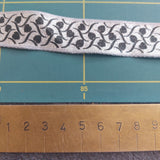 Ribbon Glitter Satin 25mm Silver with Black Hearts