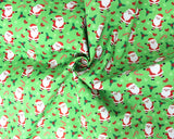 Polycotton Christmas Santa Canes on Green