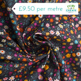 Needlecord (100% Cotton) Ditzy Floral on Black
